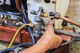 servicing-air-conditioner - Air72 Servicing an Air Conditioner